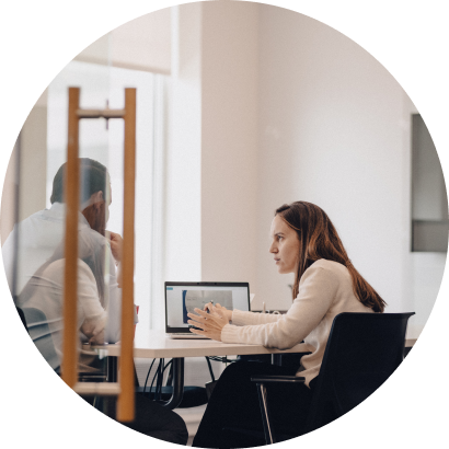 Man and woman collaborating in an office setting.